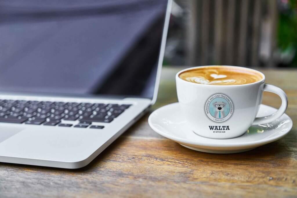 WALTA-coffee-cup-next-to-laptop-2